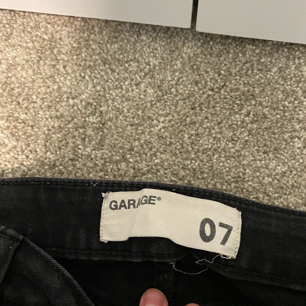 Ripped black skinny jeans